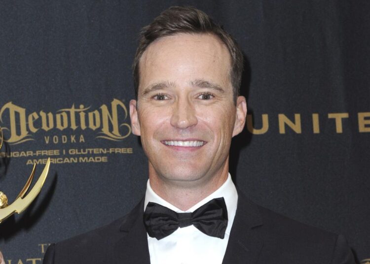 Producer Mike Richards poses in the pressroom at the 43rd annual Daytime Emmy Awards on May 1, 2016, in Los Angeles. Richards is out as executive producer of “Jeopardy!”, days after he exited as the quiz show’s newly appointed host because of past misogynistic and other comments. Richards is also no longer executive producer of “Wheel of Fortune."