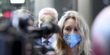 Fallen tech star Elizabeth Holmes prepares to go on trial