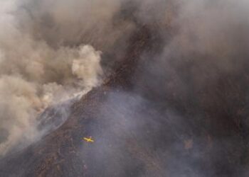 Rainfall helps firefighters control southern Spain’s inferno