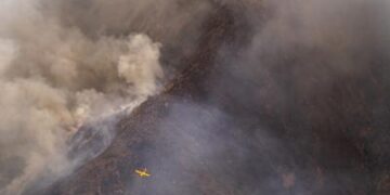 Rainfall helps firefighters control southern Spain’s inferno