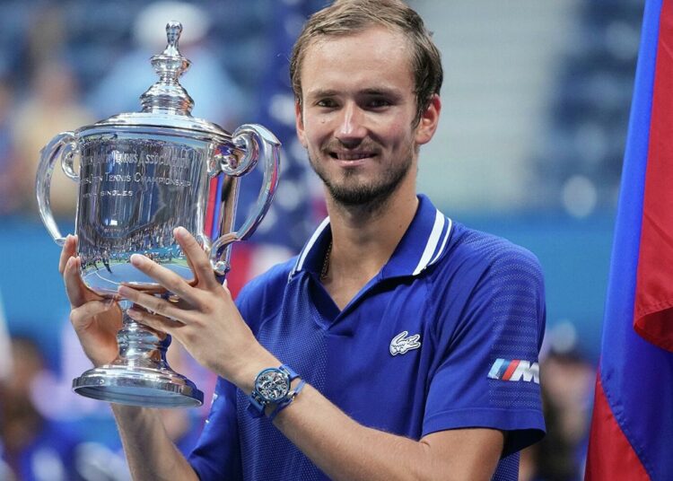 Daniil Medvedev of Russia posing with the US Open trophy.