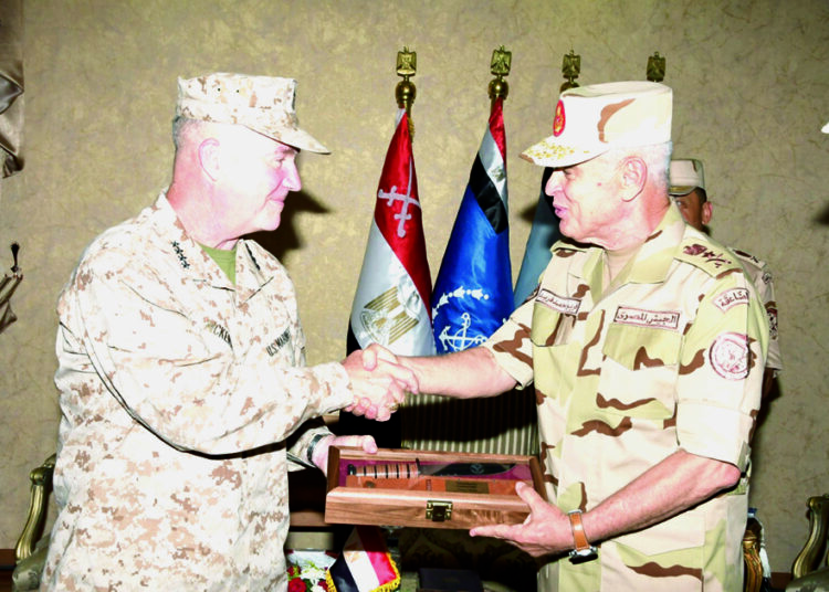 CoS, US CENTCOM chief inspect ‘Bright Star 2021’ drill troops 1 - Egyptian Gazette Armed Forces Chief of Staff Lieutenant General Mohamed Farid welcoming the commander of the US Central Command, Lieutenant General Kenneth McKenzie, at the start of their meeting on Sunday.