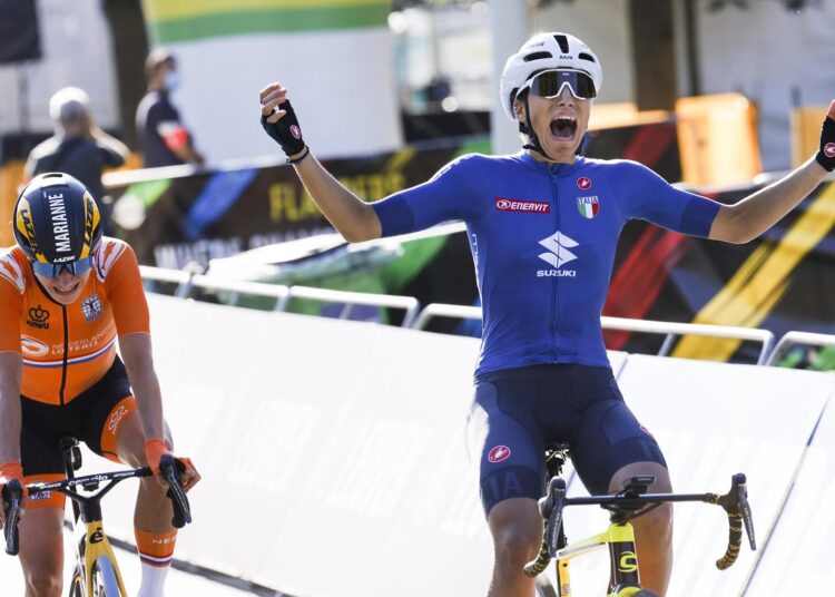 Elisa Balsamo of Italy (R) crosses the finish line ahead of Marianne Vos of The Netherlands to win the women's road race of the World Road Cycling Championships in Leuven, Belgium.