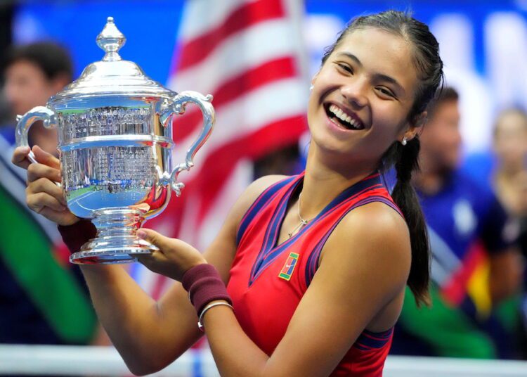 File photo of Emma Raducanu of Great Britain celebrating with the championship trophy in the women's singles final of the 2021 US Open tennis tournament.