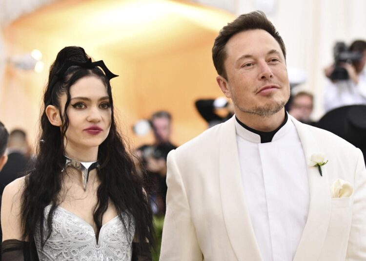 Grimes, left, and Elon Musk attend The Metropolitan Museum of Art's Costume Institute benefit gala in New York on May 7, 2018.