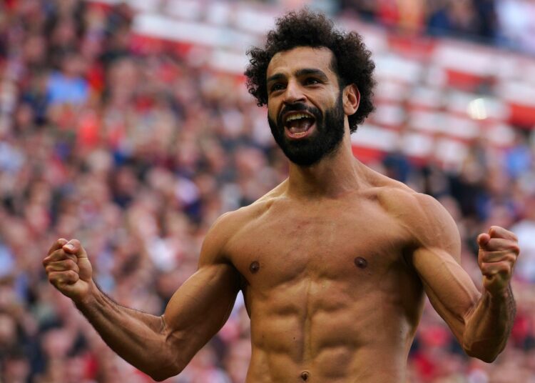 Salah strike helps Liverpool to go top as City held by Saints 1 - Egyptian Gazette Liverpool's Egyptian midfielder Mohamed Salah celebrates after scoring their second goal against Crystal Palace.