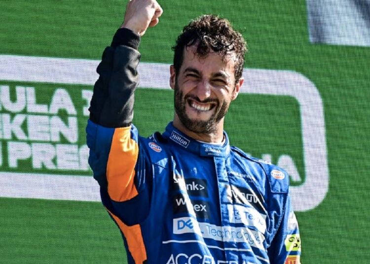 McLaren's Daniel Ricciardo celebrates on the podium after winning the Italian Grand Prix.