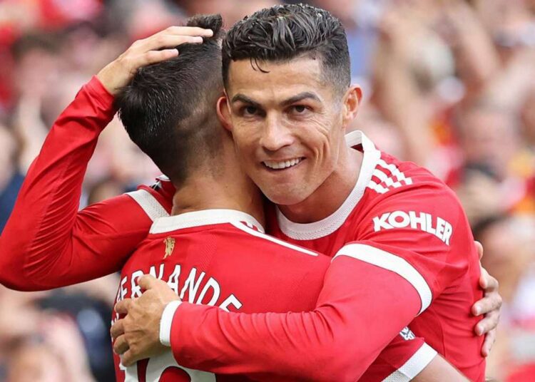 Manchester United's Cristiano Ronaldo celebrates after scoring the opening goal during the English Premier League match against Newcastle United.