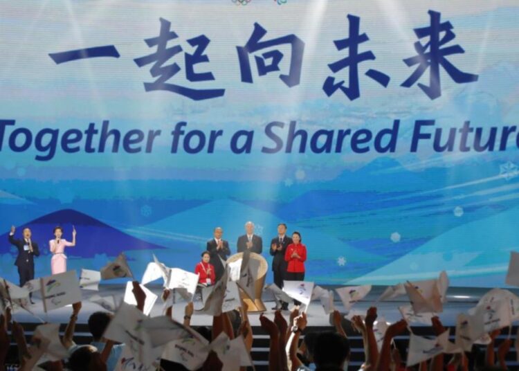 Singers perform on stage at a ceremony unveiling the slogan for Beijing 2022 Winter Olympics, in Beijing, China September 17, 2021.