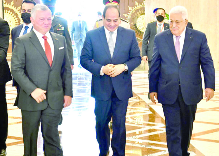 President Abdel Fattah El Sisi, Palestinian President Mahmoud Abbas and Jordanian King Abdullah II ahead of  their summit in Cairo on Thursday.