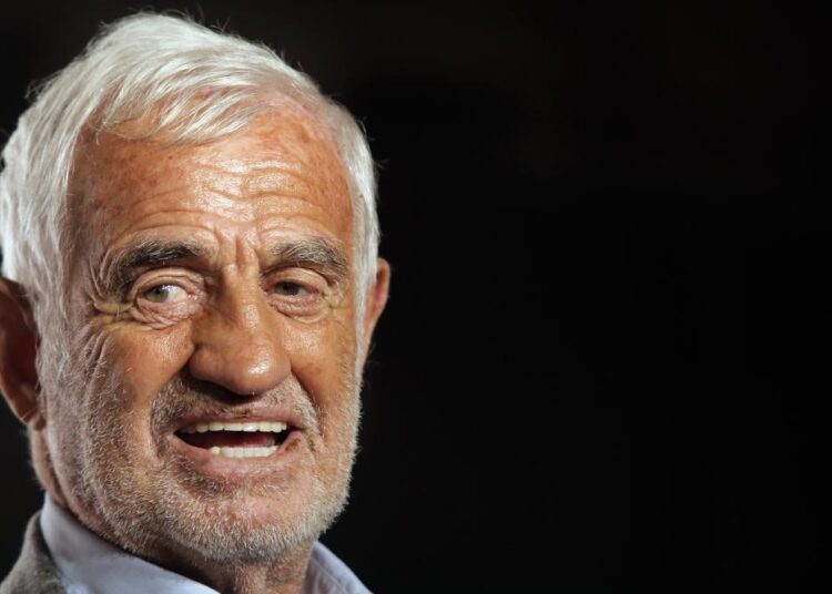 In this Oct. 14, 2013 file photo, French actor Jean-Paul Belmondo arrives at the opening ceremony of the 5th edition of the Lumiere Festival, in Lyon, central France. French New Wave actor Jean-Paul Belmondo has died, according to his lawyer’s office on Monday Sept. 6, 2021.