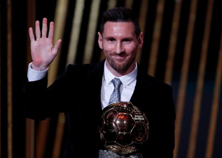 File picture of Lionel Messi waving to media after accepting his sixth Ballon d’Or award.