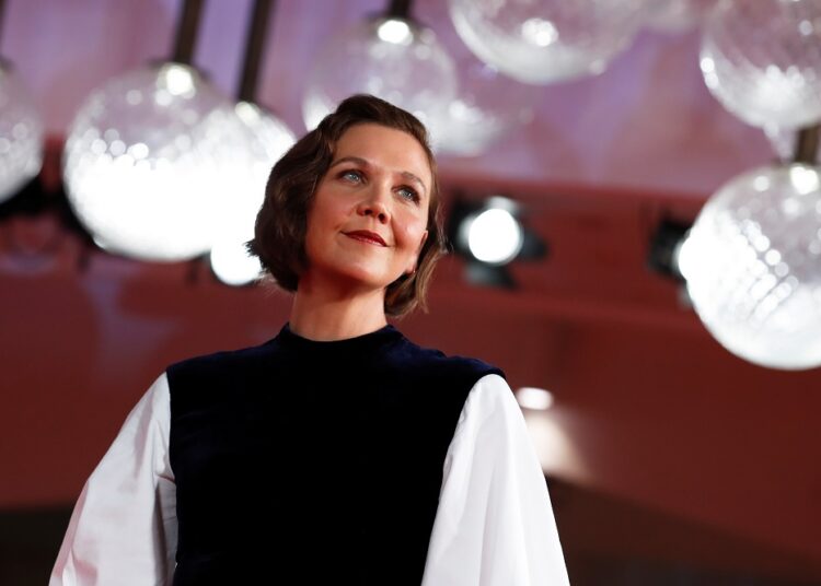 Actor Maggie Gyllenhaal pose ahead of the screening of the film ‘The Lost Daughter’ at the 78th Venice Film Festival in Venice, yesterday.