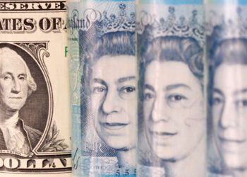 Sterling falls versus dollar after US yields surge