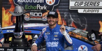 Larson secures spot in NASCAR’s playoffs