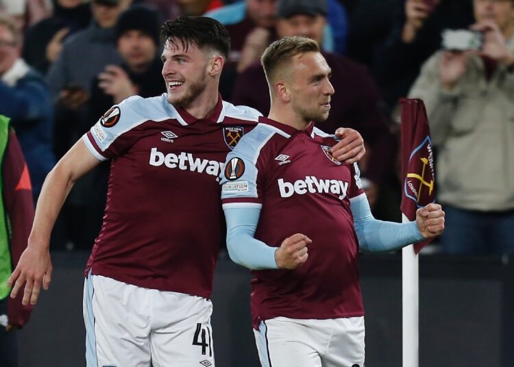 West Ham United's Jarrod Bowen (R) celebrates scoring their third goal against Genk with Declan Rice in London.