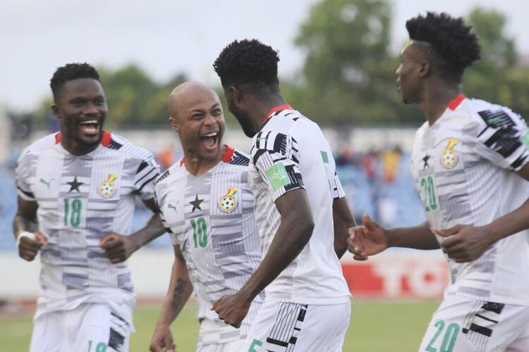 Ghana’s players celebrating after scoring against Zimbabwe.