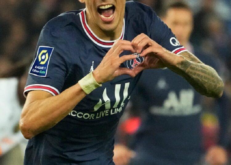 PSG's Angel Di Maria celebrates after scoring his side's second goal during the French League One match against Lille in Paris.