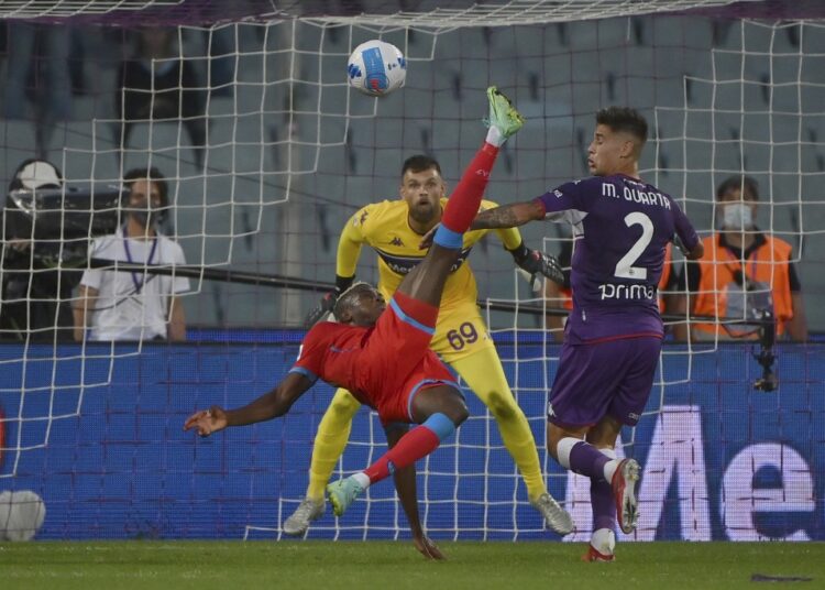 Napoli's Victor Osimhen goes for an overhead kick during the Serie A match against Fiorentina at the Florence Artemio Franchi stadium.