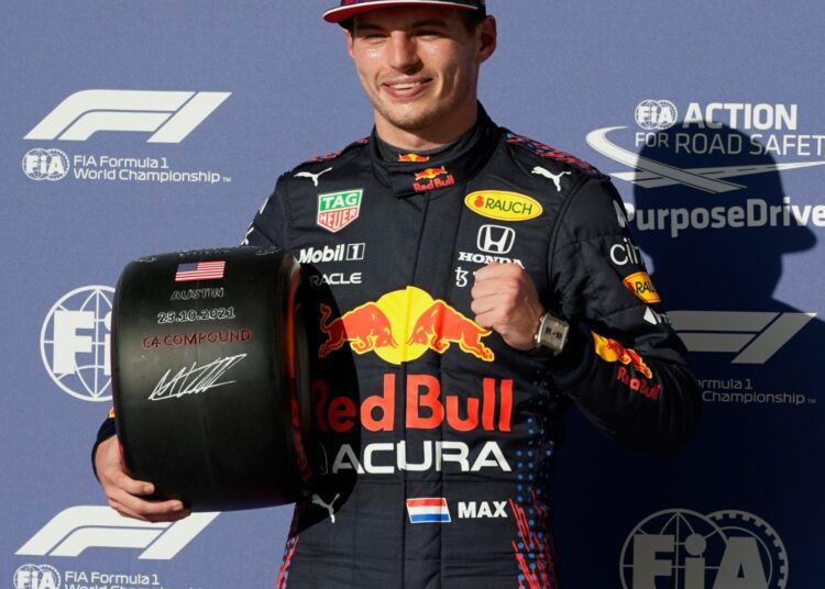 Red Bull's Max Verstappen celebrates after winning the US Grand Prix.