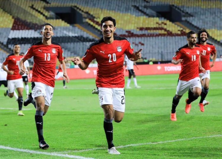 Egypt’s and Stuttgart winger  Mohamed Marmoush (C) celebrating with teammates after scoring the Pharaohs sole goal against Libya in a 2022 FIFA World Cup qualification Group F match.