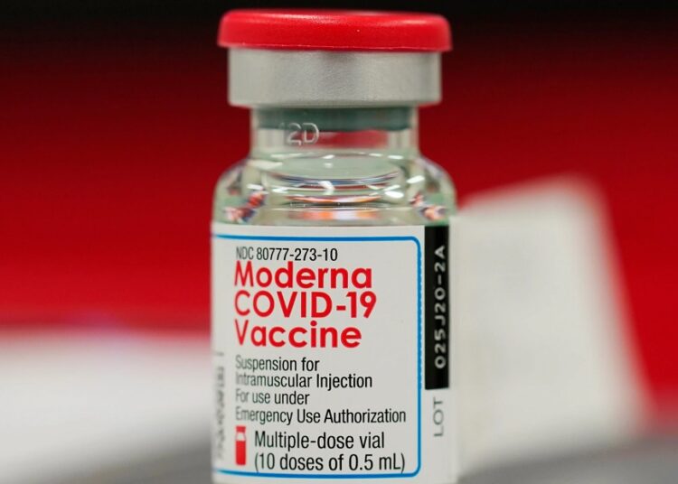 FDA panel endorses lower-dose Moderna COVID shot for booster 1 - Egyptian Gazette Photo shows a vial of the Moderna COVID-19 vaccine in the first round of staff vaccinations at a hospital in Denver.