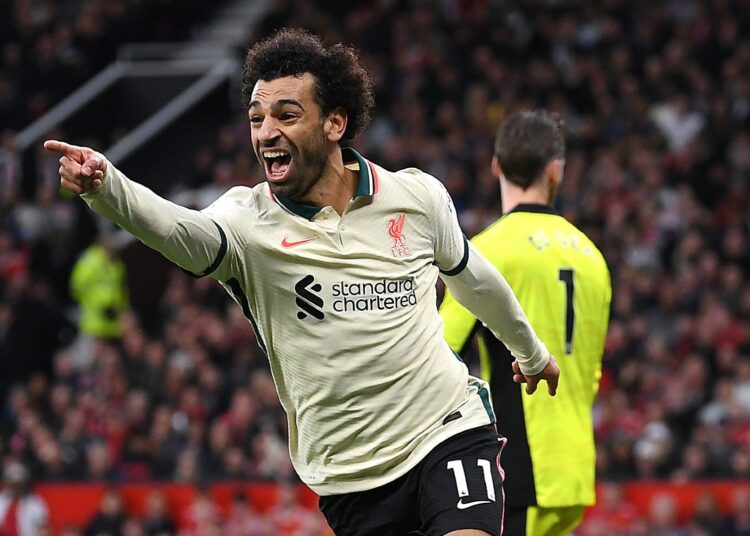 Liverpool's Mohamed Salah celebrates scoring their fifth goal and his hat-trick against Manchester United.