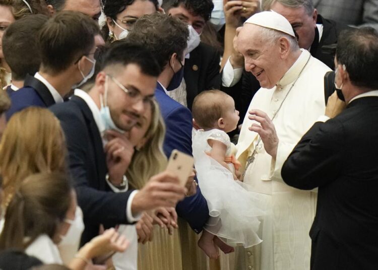 Pope expresses ‘shame’ at scale of clergy abuse in France 1 - Egyptian Gazette Pope Francis gives his blessing to a baby as he meets the faithful at the end of his weekly general audience in the Pope Paul VI hall at the Vatican, Wednesday, October 6, 2021.