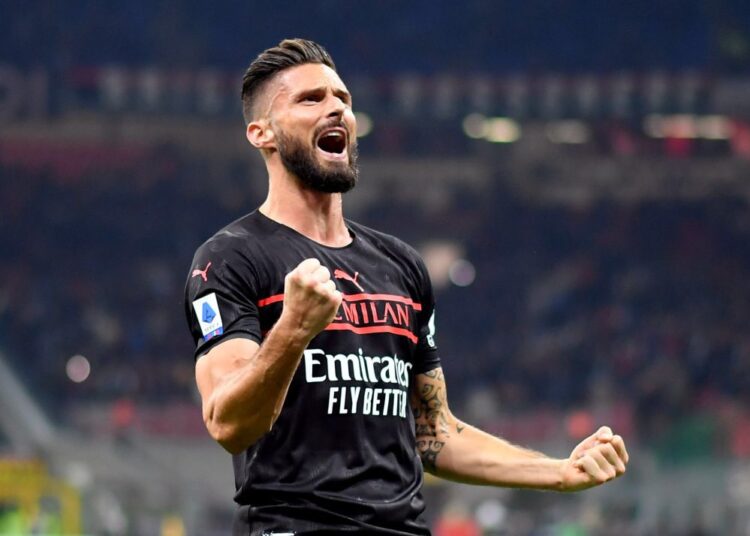 AC Milan's Olivier Giroud celebrates scoring their first goal against Torino at the San Siro, Milan.