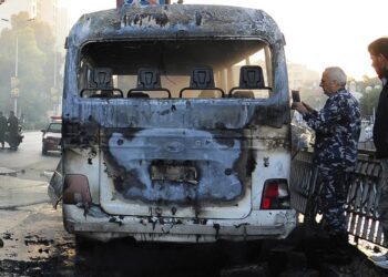 Bus bombs kill 14 in Syria capital; shells elsewhere kill 10