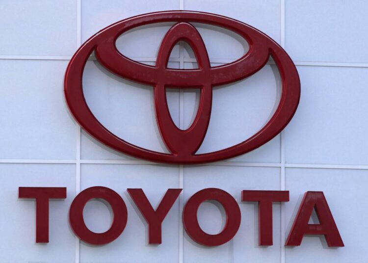 The Toyota logo is shown on a dealership in Manchester, N.H., in this Thursday, Aug. 15, 2019, file photo. Toyota plans to build a new $1.29 billion factory in the U.S. to manufacture batteries for gas-electric hybrid and fully electric vehicles. The plant location wasn't announced, but the company said it eventually will employ 1,750 people and start making batteries in 2025, gradually expanding through 2031.
