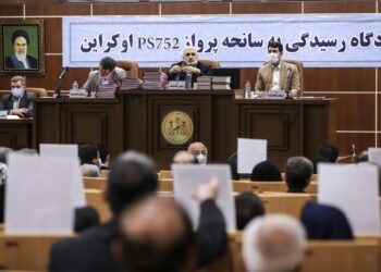 Iran publishes photos of closed hearing into plane shootdown
