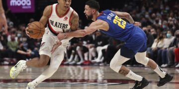 McCollum scores 32 as Blazers top skidding Nuggets 119-100