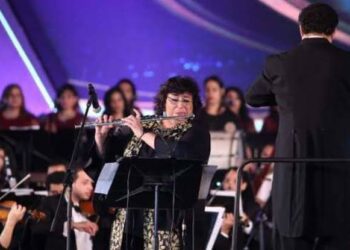 Egypt’s culture minister plays music on flute at festival
