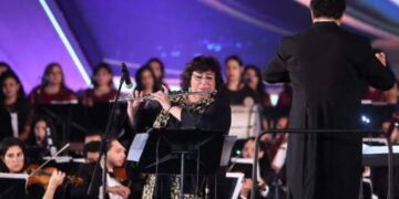 Egypt’s culture minister plays music on flute at festival
