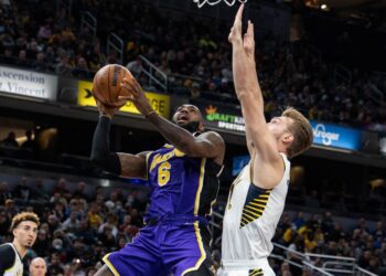 James shines late as Lakers down Pacers in overtime
