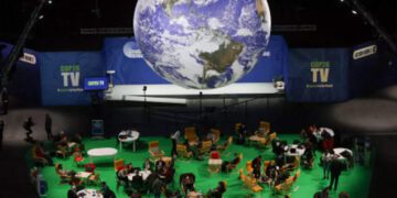 With COP26 in overtime, latest draft deal keeps eye on climate ambition