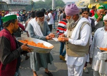 Modi backs down on farm reforms in surprise victory for protesters