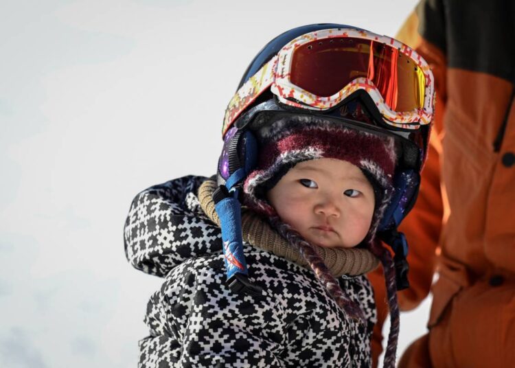 Yuji's father says he has been inspired to train as a professional snowboarding coach.
