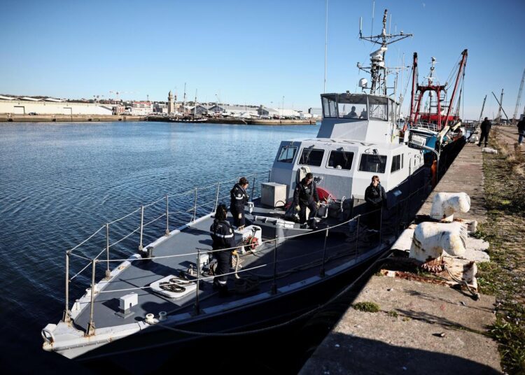 The French Gendarmerie patrol boat Athos prepare to leave as a British trawler Cornelis Gert Jan is seen moored in the port of Le Havre after France seized on Thursday a British trawler fishing in its territorial waters without a licence, in Le Havre, France, October 28, 2021.