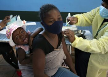 South African scientists detect new virus variant amid spike