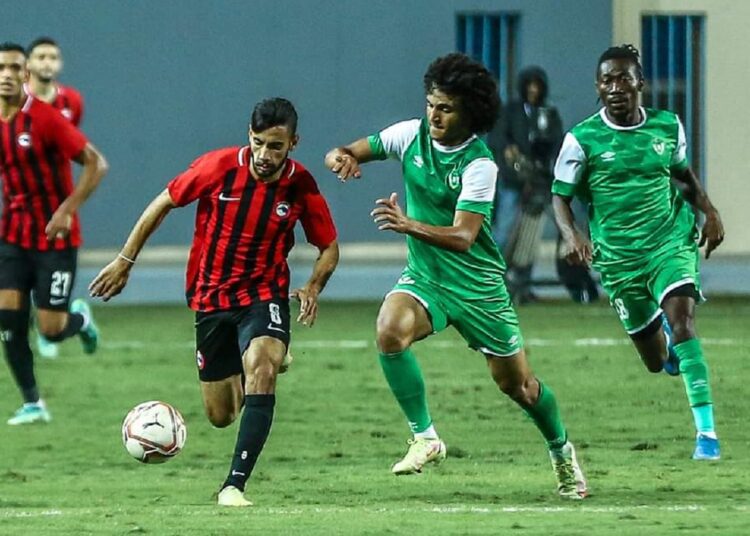 Future’s playmaker Nasser Maher (2nd L) vying for the ball against Eastern Company defender during their Egyptian Premier League match at Petrosport Stadium in Cairo.