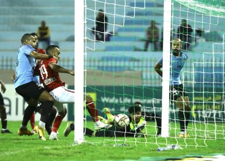 Al-Ahly’s Mohamed Magdi 'Afsha' scoring his side’s first goal against Ghazl el-Mahalla.