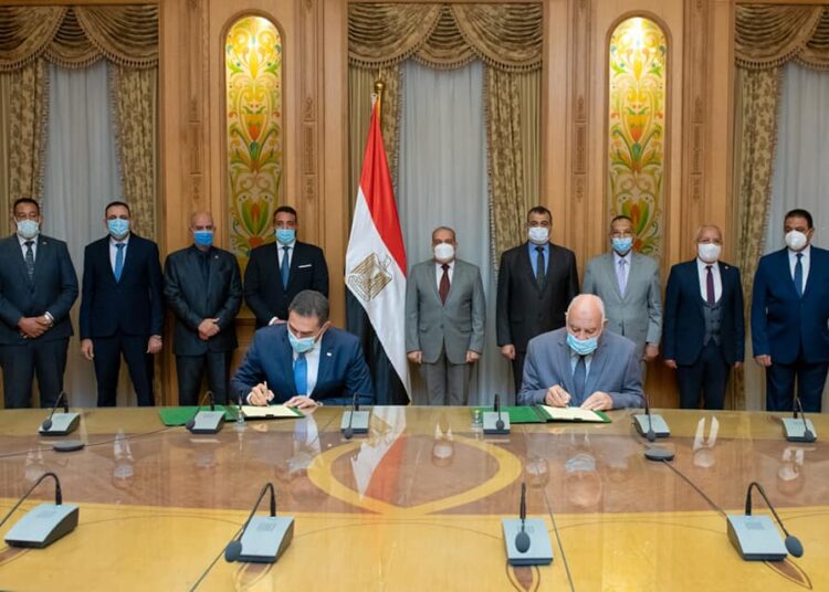 Egypt, US sign co-operation protocol in water treatment field 1 - Egyptian Gazette State Minister for Military Production Mohamed Morsi during the signing ceremony of a co-operation protocol between Abu Zaabal Company for Specialty Chemicals (Factory 18) and US company "Nalco Water".