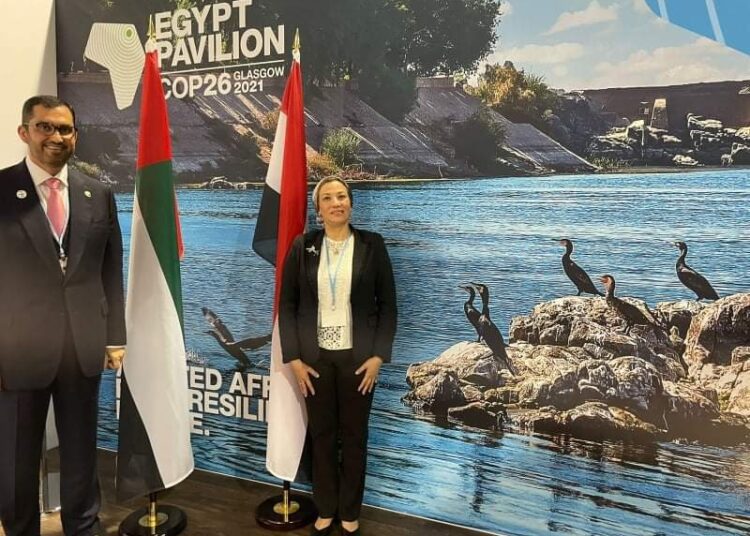 UAE Minister of Industry and Advanced Technology and Special Envoy for Climate Change Sultan bin Ahmed Al Jaber (L) congratulated Egyptian Environment Minister Yasmine Fouad after selecting Egypt for hosting the 27th UN Climate Change Conference of the Parties (COP27). (Photo courtesy of the Egyptian Ministry of Environment official Facebook page)