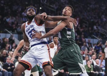 NBA champion Bucks hold off Knicks, Nets work over Magic in Orlando