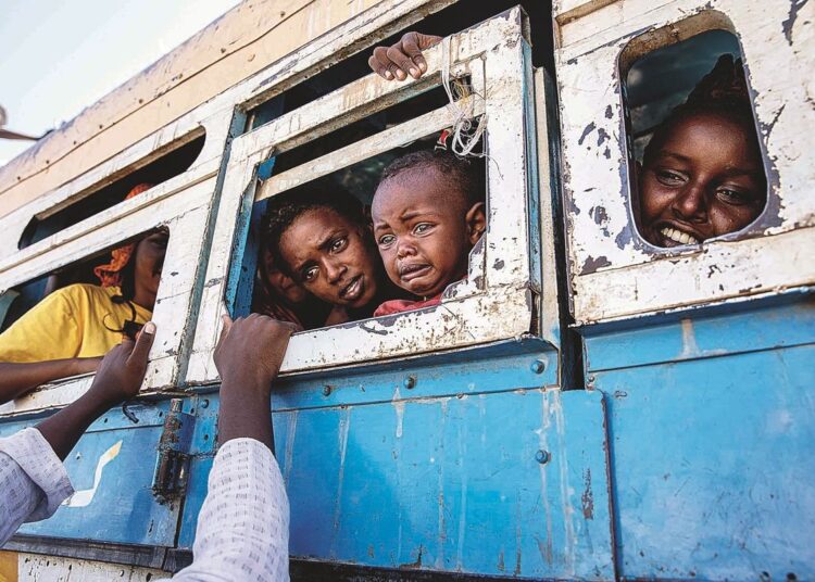 Refugees fleeing the conflict in Tigray set off on Dec 1, 2020, from Hamdayet in eastern Sudan for a shelter near the Ethiopian border.