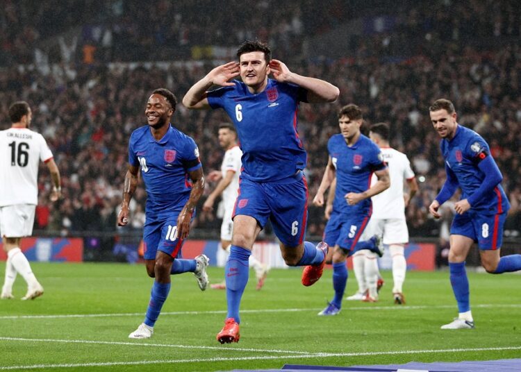 England's Harry Maguire celebrates after scoring the first goal against Albania November 13, 2021.