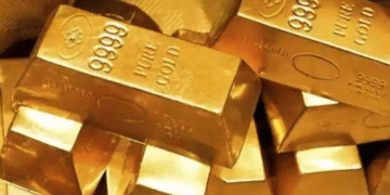 Gold jumps as new virus variant fears grip investors