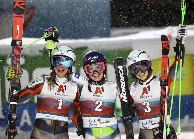 Slovenia's Andreja Slokar (C) winner of an alpine ski, women's World Cup parallel event, poses with second placed Norway's Thea Louise Stjernesund (L) and third placed Norway's Kristin Lysdahl, in Lech/Zuers, Austria.